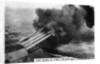 The guns of the battleship HMS Nelson firing by Anonymous