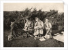 Women enjoying a picnic by Anonymous
