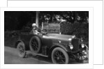 Woman driving a car by Anonymous