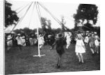 Children dancing round a maypole by Anonymous