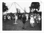 Children dancing round a maypole by Anonymous