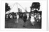 Children dancing round a maypole by Anonymous