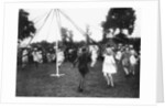Children dancing round a maypole by Anonymous