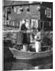 Greengrocer bringing goods by boat, Marken, Holland by Donald McLeish