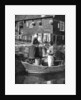 Greengrocer bringing goods by boat, Marken, Holland by Donald McLeish