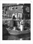 Greengrocer bringing goods by boat, Marken, Holland by Donald McLeish