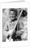 Uzbek schoolboy working on a farm by Anonymous