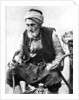 A peasant drinking coffee and smoking a huqqah, Izmir, Turkey by Anonymous