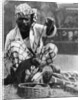 Indian snake charmer with mongoose and cobra by Fox