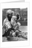 Indian snake charmer with mongoose and cobra by Fox