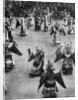 Masked dancers, Tibet by Ewing Galloway
