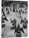 Masked dancers, Tibet by Ewing Galloway