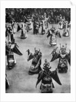 Masked dancers, Tibet by Ewing Galloway
