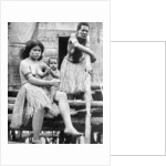 A mother and her child, Papua, New Guinea by Ewing Galloway