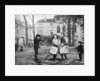 Children skipping in the Grand Place, Bruges, Belgium by FC Davis