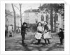 Children skipping in the Grand Place, Bruges, Belgium by FC Davis