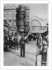 A man carrying many baskets on his head, Covent Garden, London by Anonymous