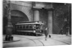 A tram running beneath Kingsway, Aldwych and Somerset House, London by Anonymous