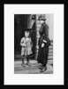 An East End child and a policewoman, London by Anonymous