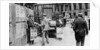 The lunchtime newspaper paper headlines, Trafalgar Square, London by Anonymous