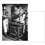 Cutting a key barrel, London by Anonymous