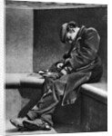 A man sleeping on Blackfriars Bridge, London by Walter Benington
