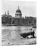 Thames waterman and his boat on the 'beach' at Bankside, London by McLeish