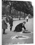 Pavement artist, Embankment, London by McLeish