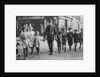Policeman helping schoolchildren across the road, East End, London by Anonymous
