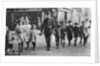 Policeman helping schoolchildren across the road, East End, London by Anonymous