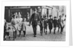 Policeman helping schoolchildren across the road, East End, London by Anonymous
