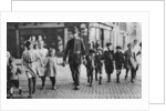 Policeman helping schoolchildren across the road, East End, London by Anonymous