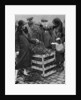 Women choosing bunches of mistletoe, Caledonian Market, London by Anonymous