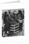 Women choosing bunches of mistletoe, Caledonian Market, London by Anonymous