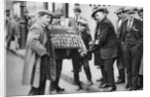 Street hawker selling football favours in King's Cross, London by Anonymous