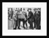 Street hawker selling football favours in King's Cross, London by Anonymous