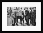Street hawker selling football favours in King's Cross, London by Anonymous