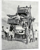 Arabian children enjoying a 'big-wheel' by Anonymous