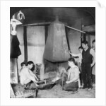 A Japanese blacksmith at his forge, Yokohama, Japan by Underwood & Underwood