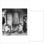 A Japanese blacksmith at his forge, Yokohama, Japan by Underwood & Underwood