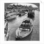 A busy freight canal in Tokyo, Japan by Underwood & Underwood