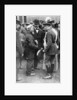 King George V and Queen Mary with a shipwright, Birkenhead, First World War by Anonymous