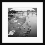 Dbobies washing clothes in the Goomti River, near Lucknow, India by Underwood & Underwood
