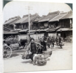 Coolies, street scene in Tokyo by Underwood & Underwood