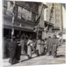 Watching a free show on Theatre Street, looking north to Asakusa Tower, Tokyo, Japan by Underwood & Underwood