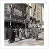 Watching a free show on Theatre Street, looking north to Asakusa Tower, Tokyo, Japan by Underwood & Underwood