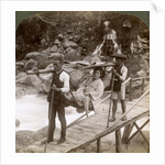 Japanese woman in a yamakago (mountain chair) crossing the torrential Daiya river near Nikko, Japan by Underwood & Underwood