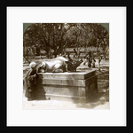 Devout woman stroking a bronze bull to cure rheumatism, Kitano Tenjin temple, Kyoto, Japan by Underwood & Underwood