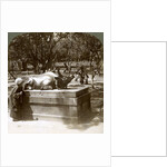 Devout woman stroking a bronze bull to cure rheumatism, Kitano Tenjin temple, Kyoto, Japan by Underwood & Underwood