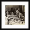 A potter and his wheel, fashioning a vase of Awata porcelain, Kinkosan works, Kyoto, Japan by Underwood & Underwood